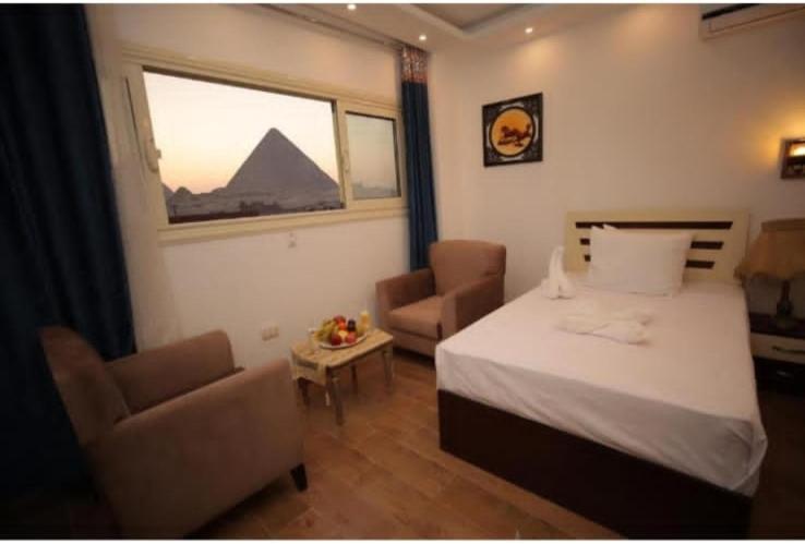 Hotel Pyramid View Gh Kafret el-Gabal Exterior foto